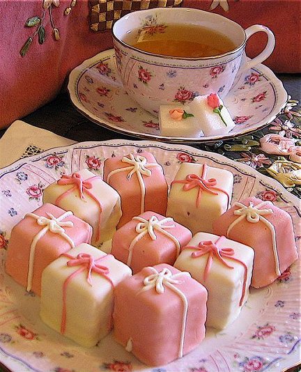Food ideas are quiche scones finger sandwiches English tea cakes 