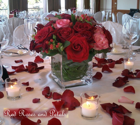 wedding altar flower arrangements with red roses
